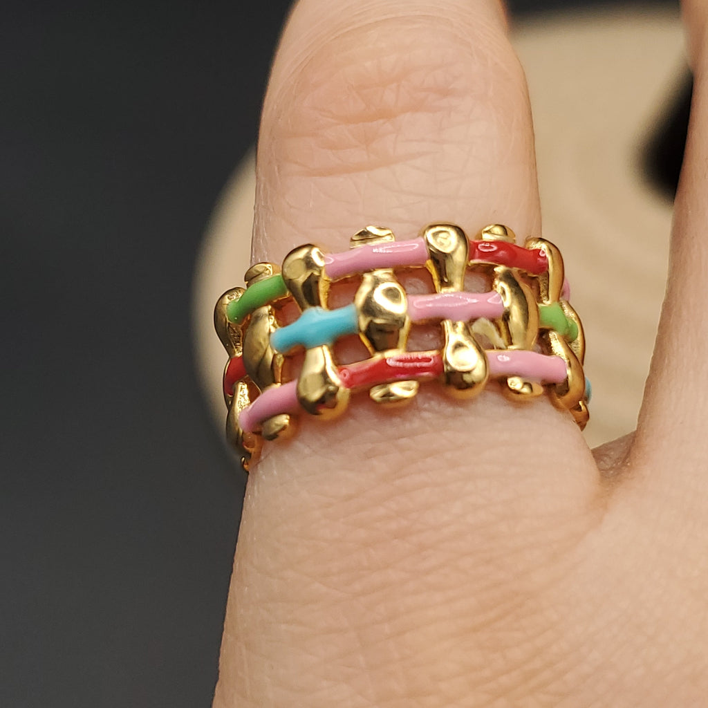 Colorful stainless steel ring with red, powder pink, light blue, light green colors.