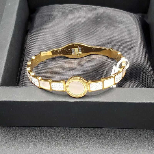 Artisanal Italian Bangle in Gold finish, with cubic zirconia stone on stones and white enamel accents