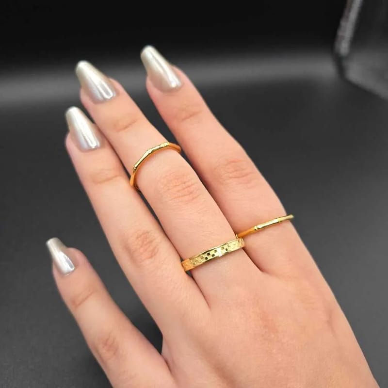 Chess Board ring in Gold finish on a neutral background
