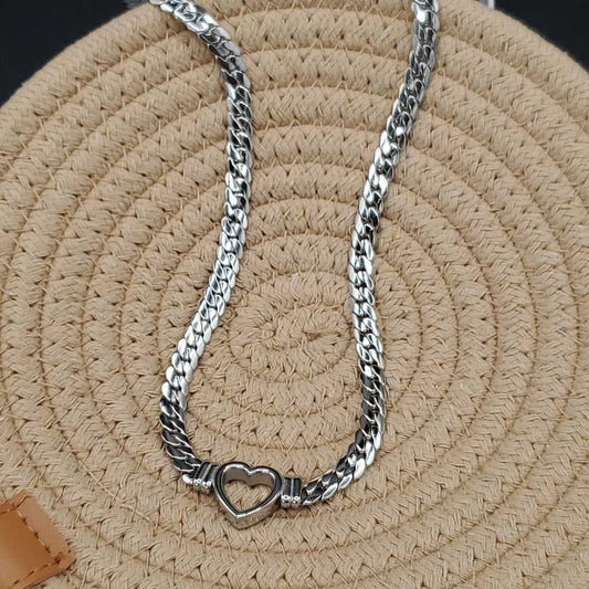 Chic Heart Necklace in Silver finish on a neutral background