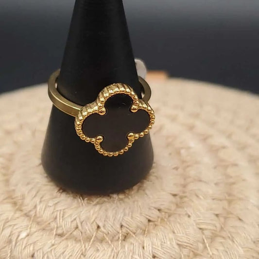 Clover Ring in Gold finish on a neutral background