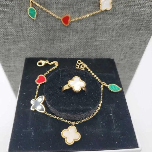 Colorful Butterfly Clover Set in Gold finish, with pearl stone on a black stand