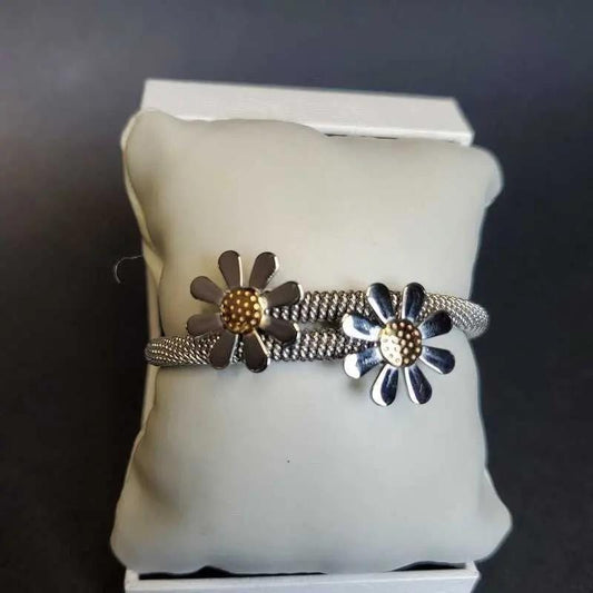 Dazzling Sunflower Bangle in Gold and Silver finish on a neutral background