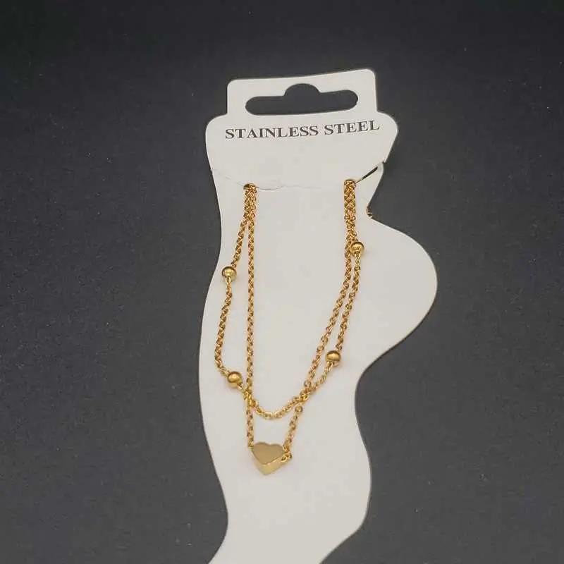 Elegant Heart Anklet in Gold finish on a neutral background