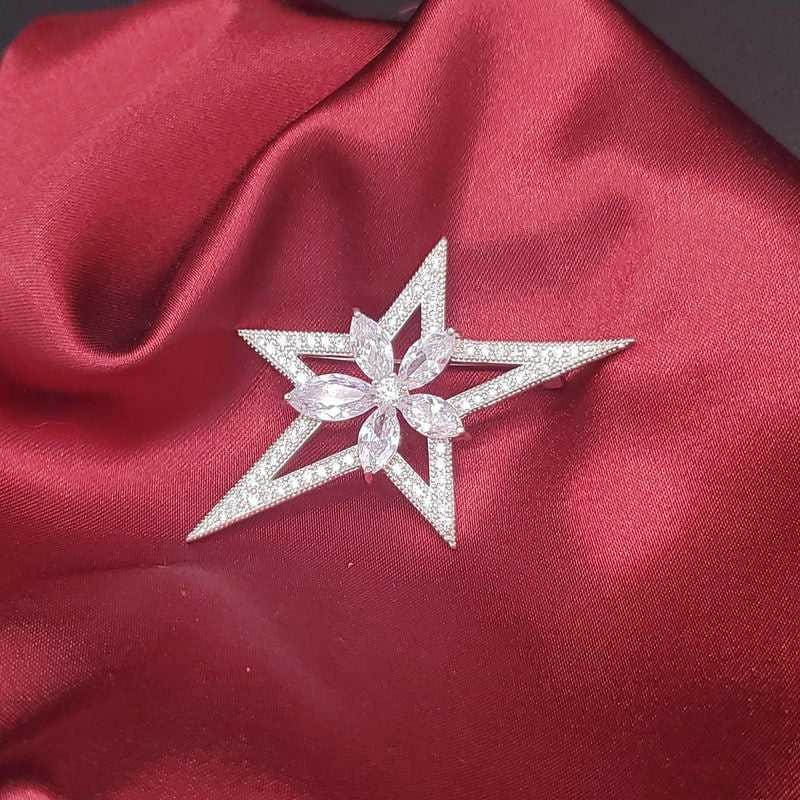 Floral Star Brooch in Silver finish, with cubic zirconia stone on stones and a central flower motif