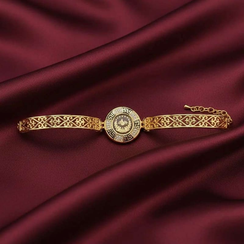 Greek Key Lira Bracelet in Gold finish, with cubic zirconia stone on accents