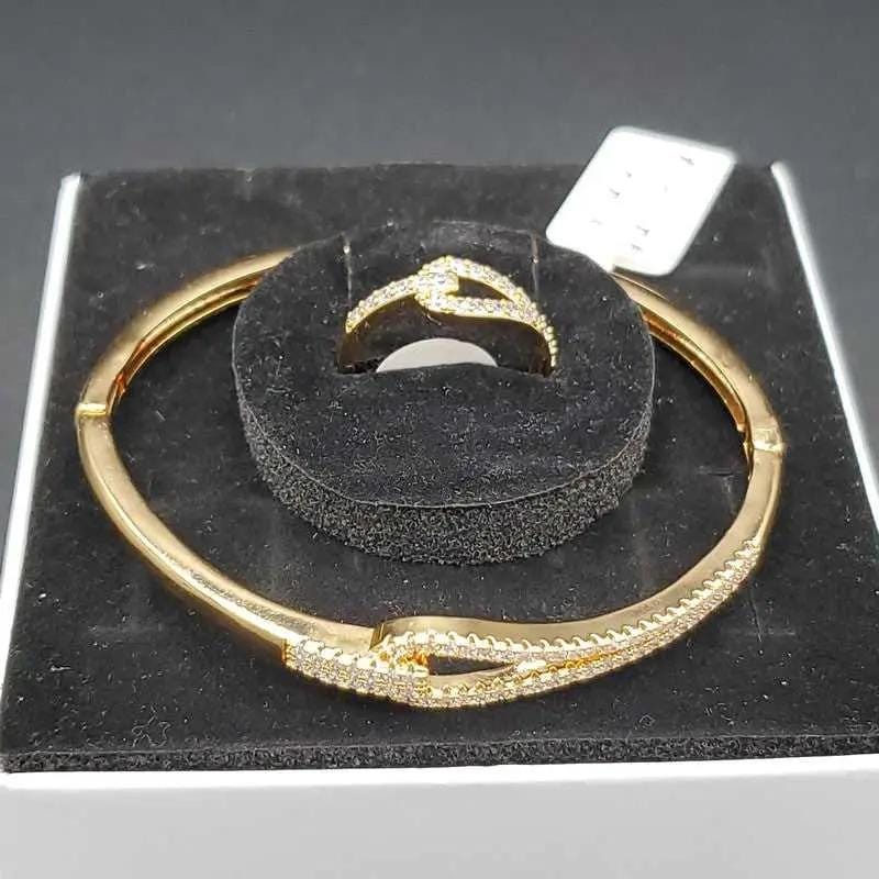 Knot Bangle & Ring Jewelry Set in Gold finish, with cubic zirconia stone on stones