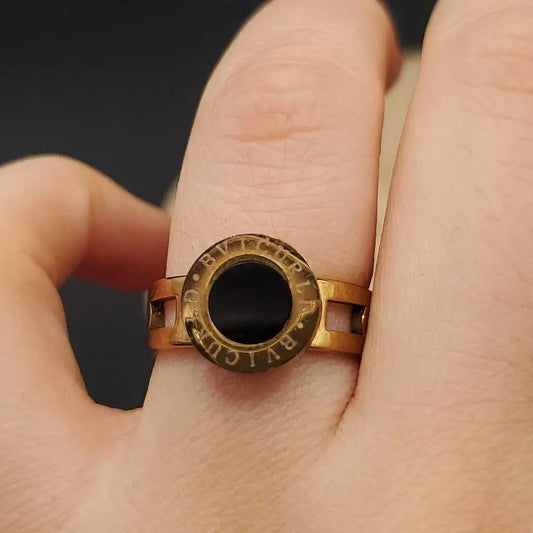Modern Italian Ring in Gold finish on a neutral background