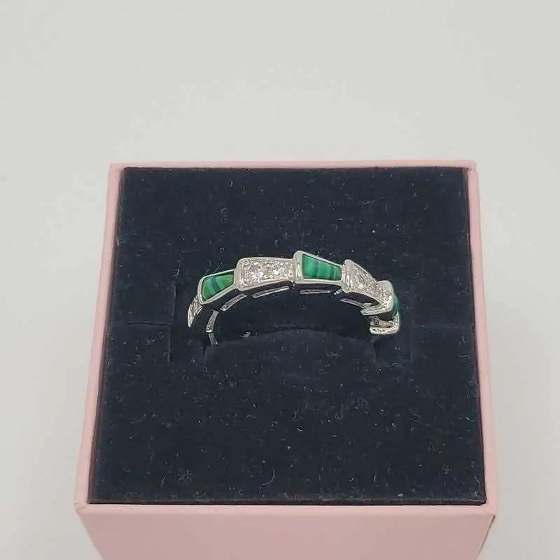Silver Ring with white and green Stones