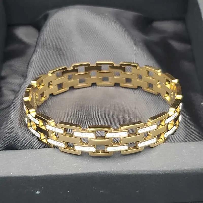 Ruby Lane Bangle in Gold finish, with cubic zirconia stone on stones, in black jewelry box