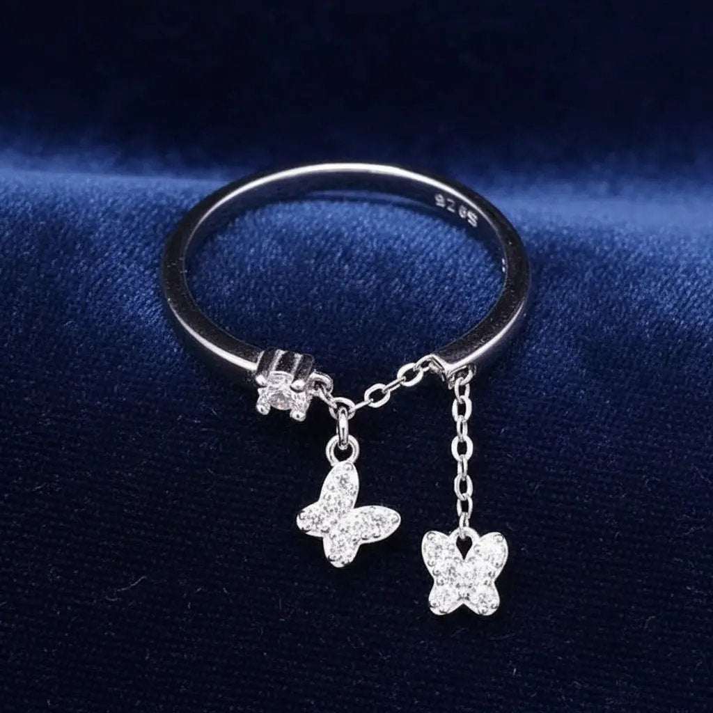 Sophisticated Butterfly Ring in Silver finish, with cubic zirconia stone on a neutral background