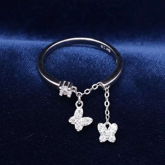 Sophisticated Butterfly Ring in Silver finish, with cubic zirconia stone on a neutral background
