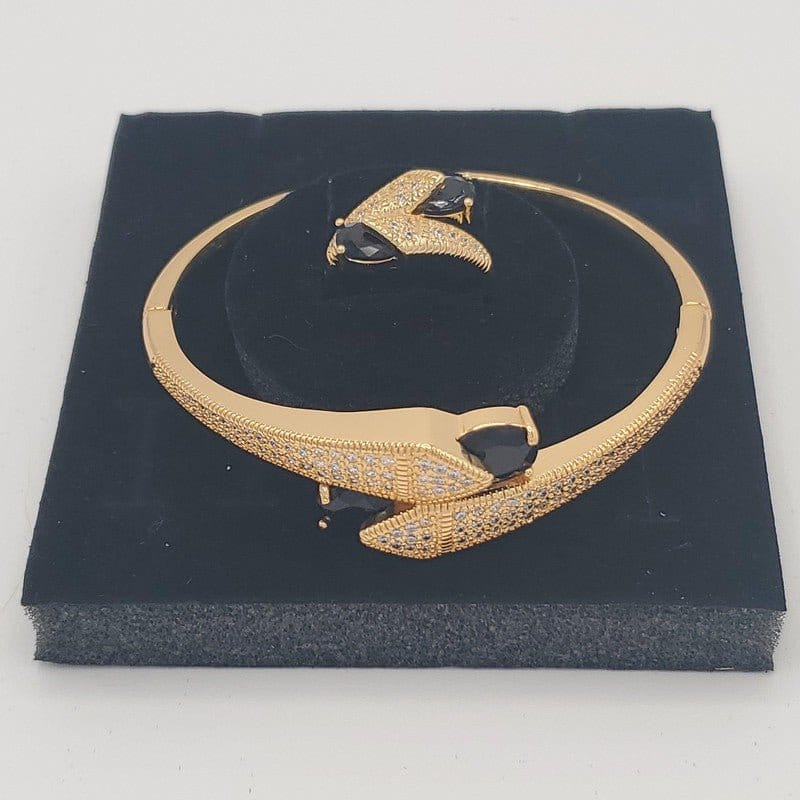 Arrow Bangle & Ring Set in Gold finish, with cubic zirconia stone on stones in a snake-like design