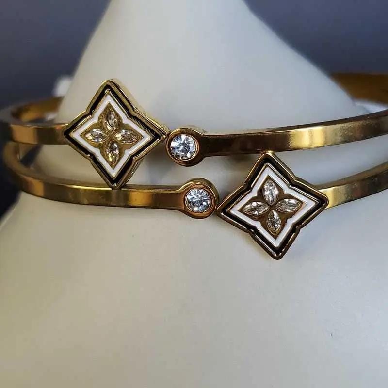 Artisanal Monogram Flower Bangles in Gold finish, with cubic zirconia stone on stones