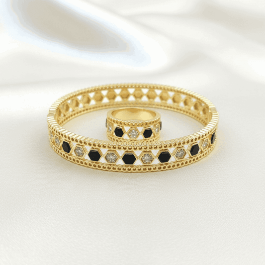 Beehive Bangle with Black Enamel and Zircons in Gold finish, with cubic zirconia stone on stones in a honeycomb pattern
