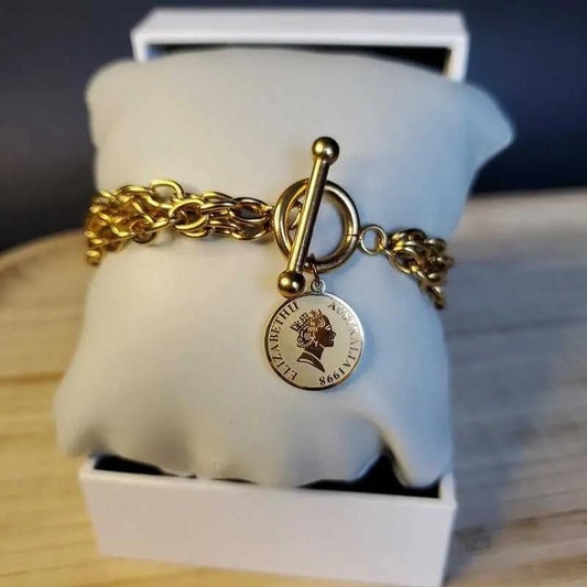 Classic Elizabeth Bracelet in Gold finish on a neutral background