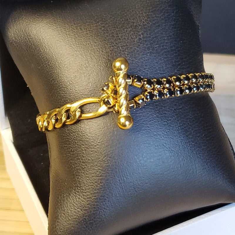 Colorful Stone Bracelet in Gold finish, with cubic zirconia stone on a neutral background
