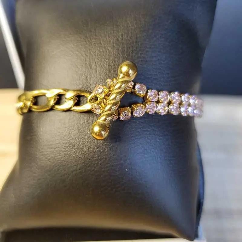 Colorful Stone Bracelet in Gold finish, with cubic zirconia stone on a neutral background