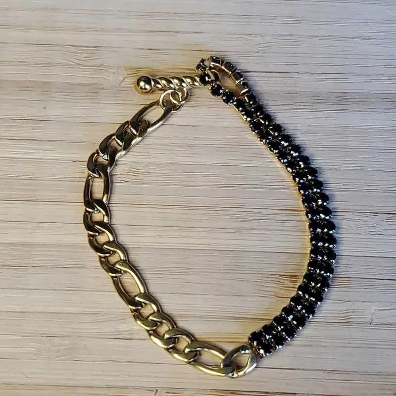 Colorful Stone Bracelet in Gold finish, with cubic zirconia stone on a neutral background