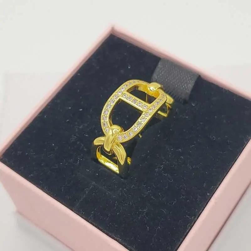 Dazzling Parisian Ring in Gold finish, with cubic zirconia stone on stones, in a pink box