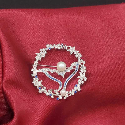 Dolphin Tail Brooch in Silver finish, with cubic zirconia stone on stones
