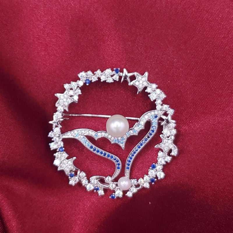 Dolphin Tail Brooch in Silver finish, with cubic zirconia stone on stones