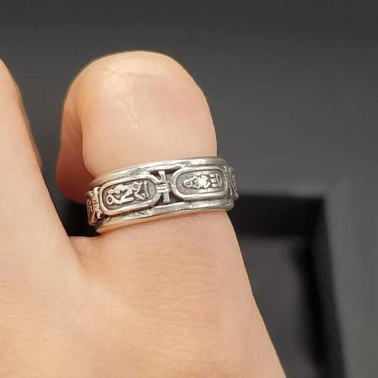 Egyptian Hieroglyphs Ring in Silver finish on a neutral background