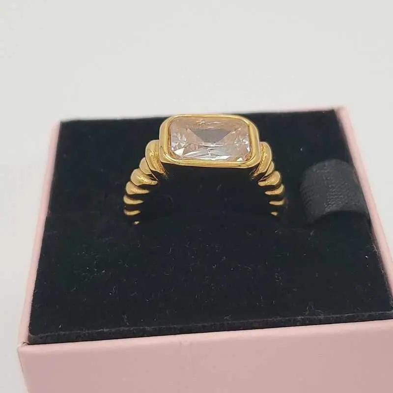 Elegant Big Stone Ring - Gold Plated Stainless Steel in Gold finish, with cubic zirconia stone on a neutral background
