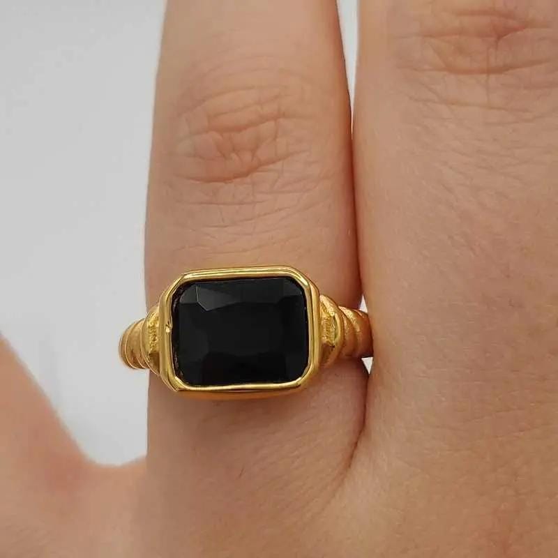 Elegant Big Stone Ring - Gold Plated Stainless Steel in Gold finish, with cubic zirconia stone on a neutral background