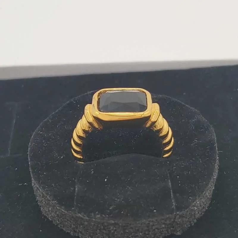 Elegant Big Stone Ring - Gold Plated Stainless Steel in Gold finish, with cubic zirconia stone on a neutral background