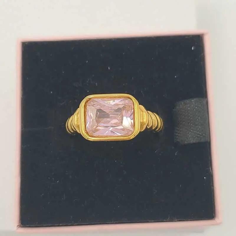 Elegant Big Stone Ring - Gold Plated Stainless Steel in Gold finish, with cubic zirconia stone on a neutral background
