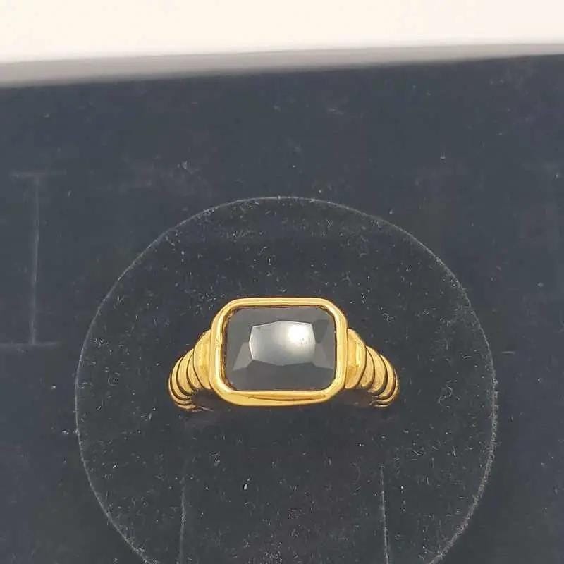 Elegant Big Stone Ring - Gold Plated Stainless Steel in Gold finish, with cubic zirconia stone on a neutral background