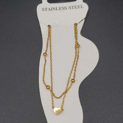 Elegant Heart Anklet in Gold finish on a neutral background