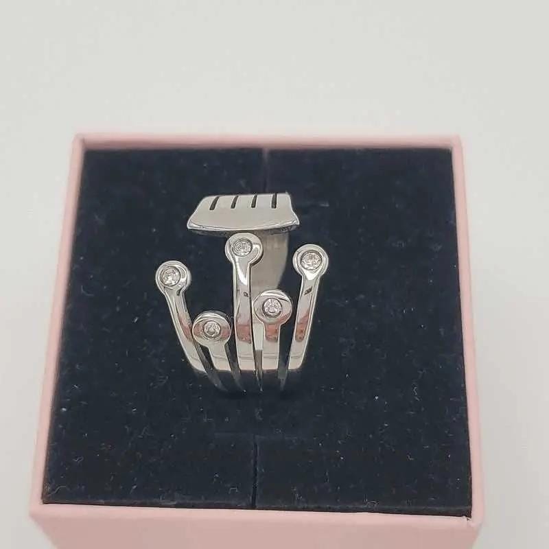 Elegant Zircon Statement Ring - Stainless Steel in Silver finish, with cubic zirconia stone on a neutral background