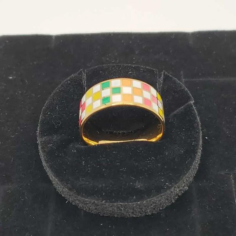 Enamel Checkerboard Ring - 21K Gold Plated Band in Gold finish on a neutral background