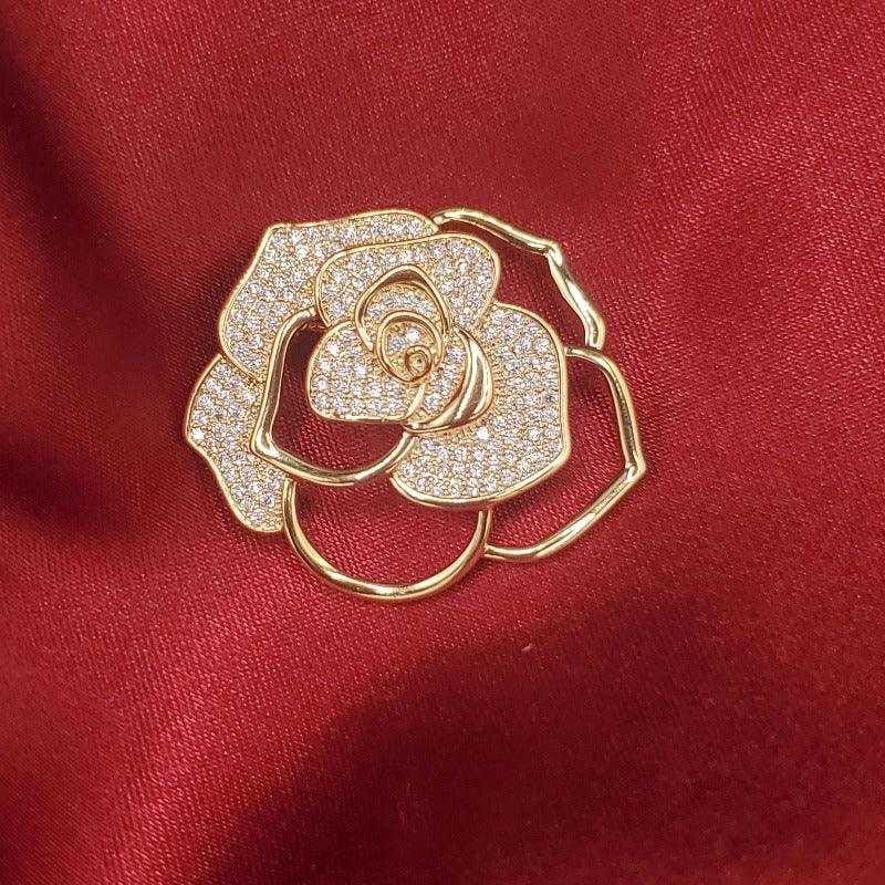 Ethereal Flower Brooch in Gold finish, with cubic zirconia stone on stones