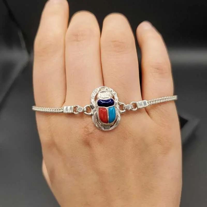 Pharaonic Scarab Bracelet in Silver finish on a neutral background