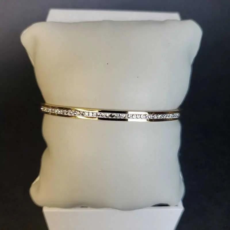Exquisite Lovely Bangle in Gold finish, with cubic zirconia stone on stones
