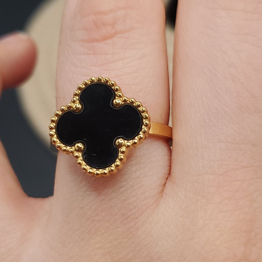 Van C*leef four leaf clover ring. filled with black enamel, stainless steel, gold color.