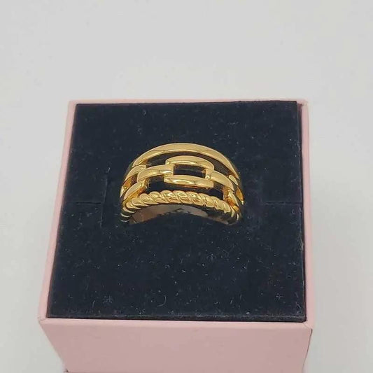 Golden Chain Ring in Gold finish on a neutral background