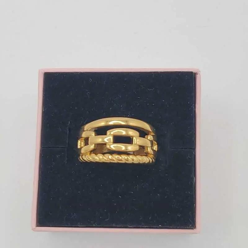 Golden Chain Ring in Gold finish on a neutral background