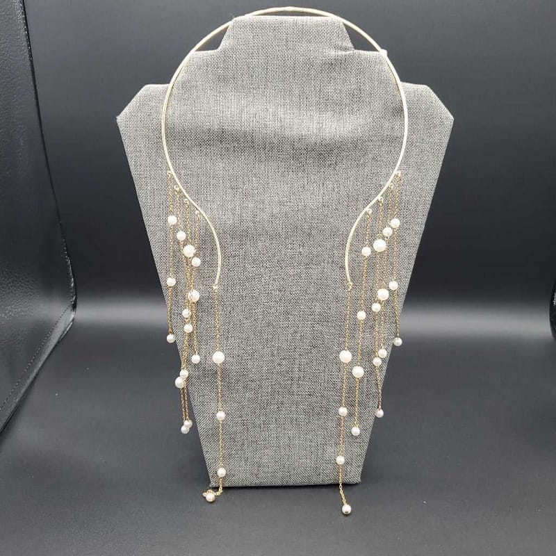 Graceful Golden Necklace in Gold finish on a neutral background
