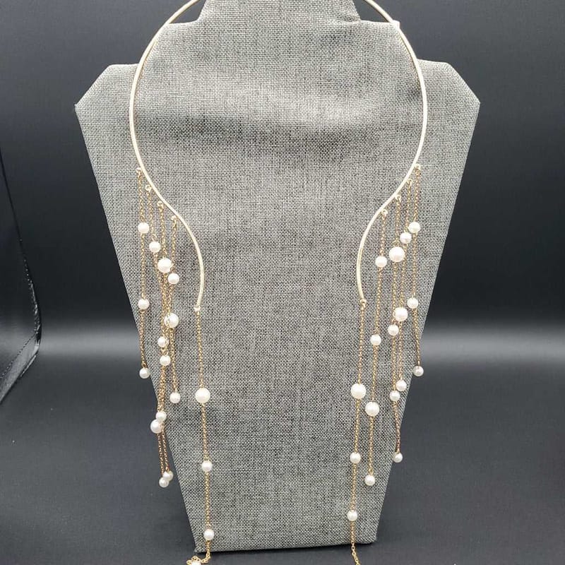 Graceful Golden Necklace in Gold finish on a display bust