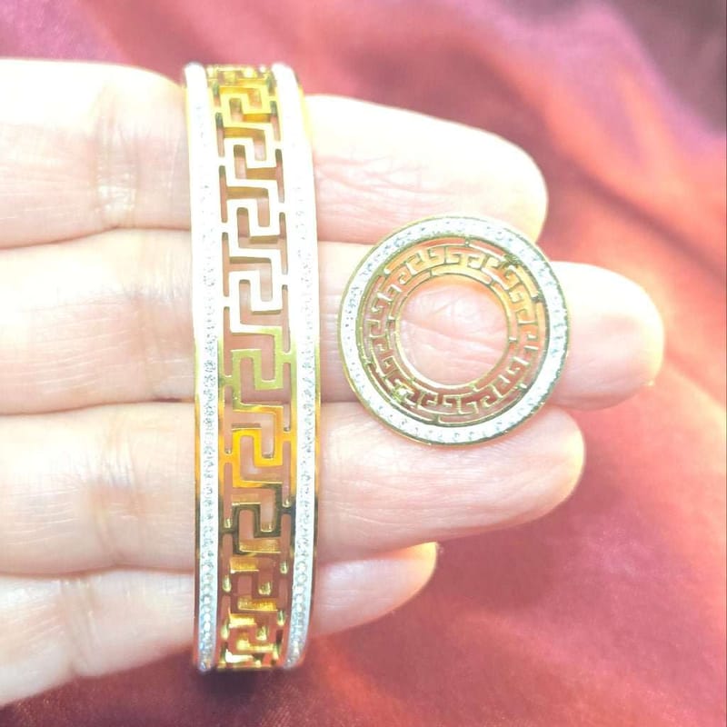 Greek Key Bangle Set with Clear Zircons in Gold finish, with cubic zirconia stone on stones set in a Greek key pattern