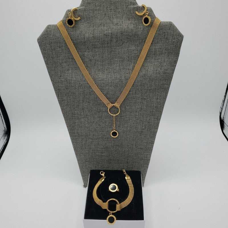 Italian Jewelry Sets in Gold finish on a neutral background