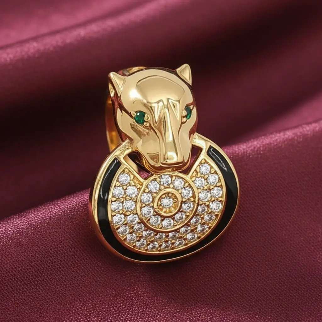 Leopard Head Ring in Gold finish, with cubic zirconia stone on and green emerald eyes, featuring black enamel