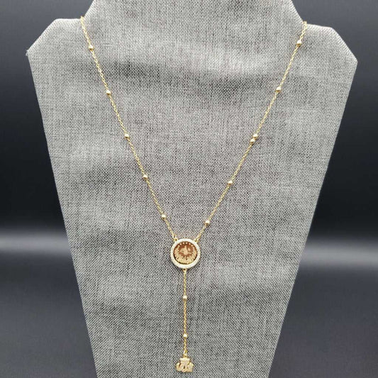 Lira Coin Necklace - Gold Plated Vintage in Gold finish, with cubic zirconia stone on a neutral background