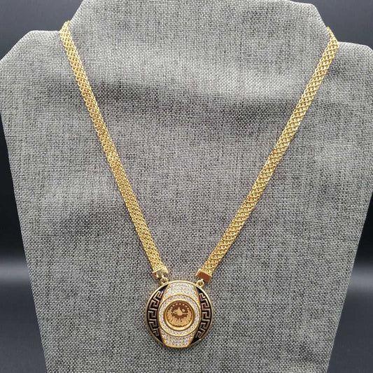Lira Coin Pendant Necklace - Minimalist Gold Plated in Gold finish, with cubic zirconia stone on a neutral background
