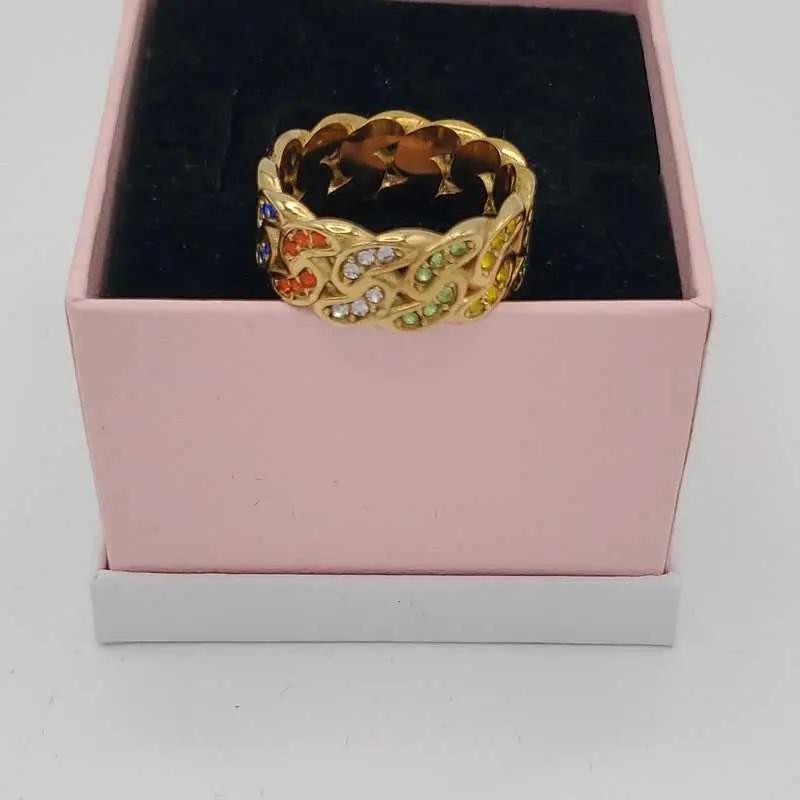 Lustrous Colorful Ring in Gold finish, with cubic zirconia stone on stones