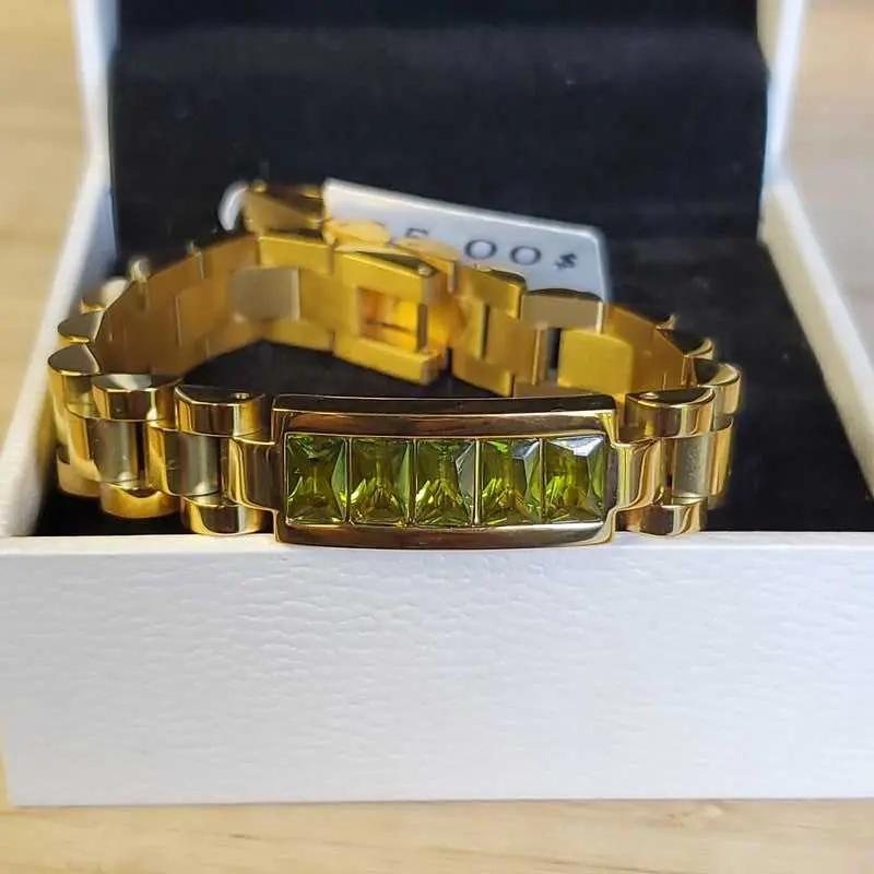 Luxury Bracelet in Gold finish on a neutral background